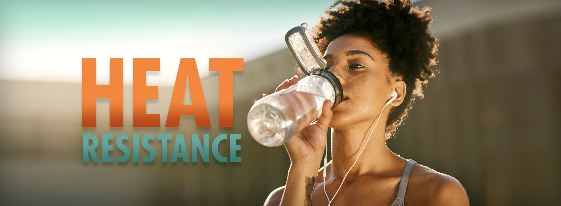 Woman drinking water and electrolytes to combat dehydration and heat stress during extreme temperatures.